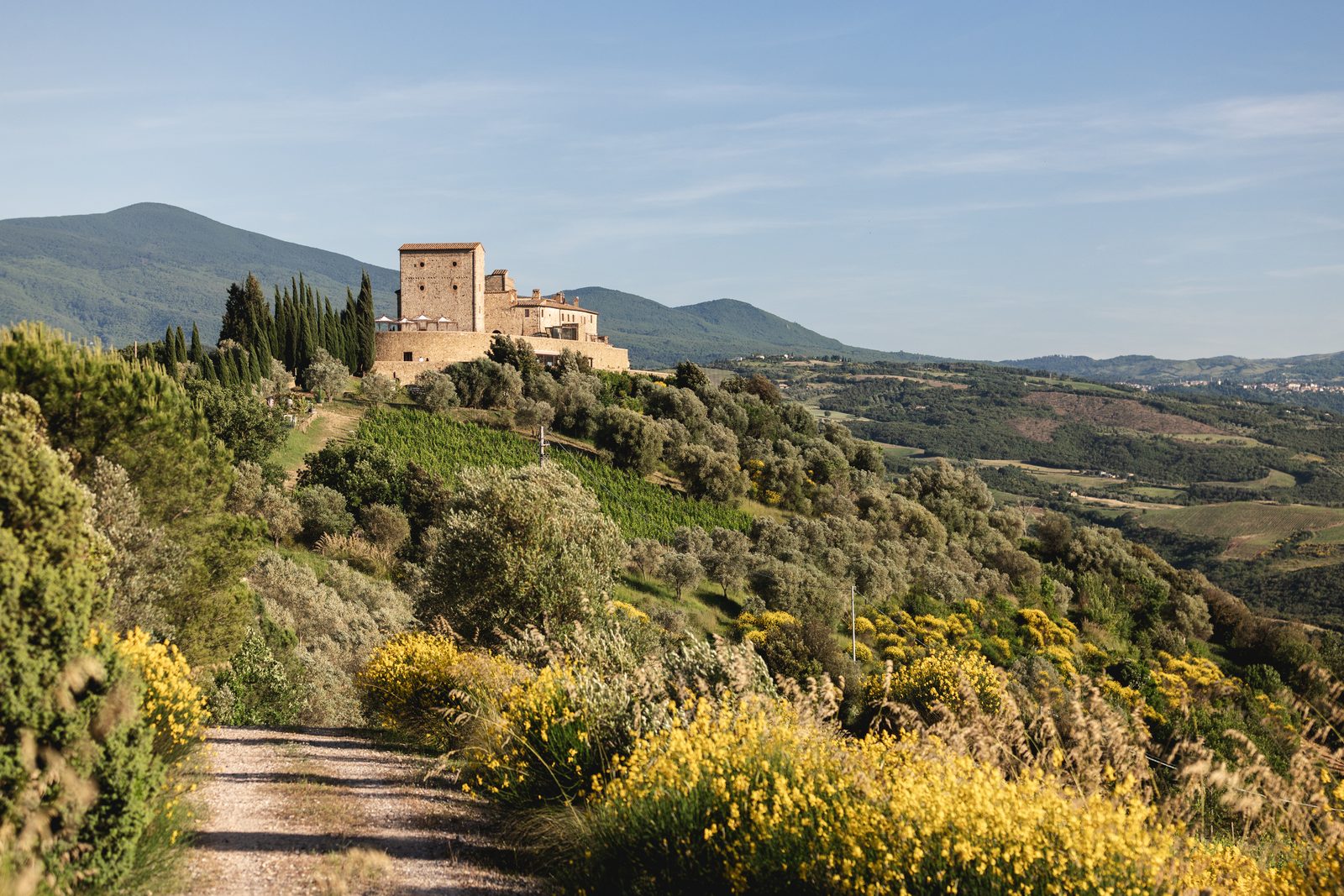 Castello di Velona on its hilltop above the Val d’Orcia