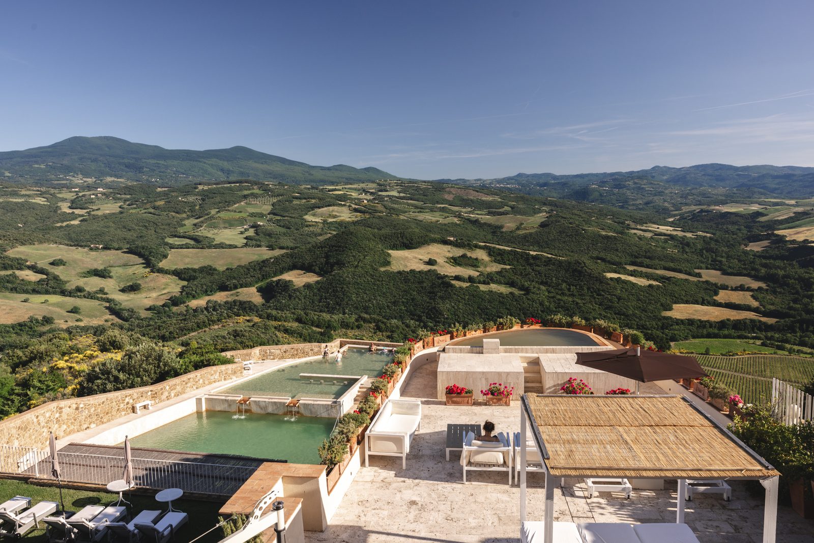 Thermal pool at Castello di Velona overlooking the Tuscan hills